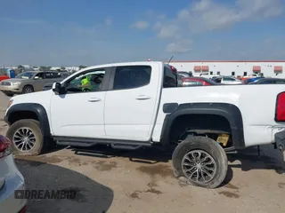 2019 Chevrolet Colorado 4WD ZR2 z VIN 1GCGTEEN7K1202435, wystawiony jako IAAI lot #42058476 z przebiegiem 150 717 mil mil oraz . Historia ofert i sprzedaży dostępna na DreamBid. Obrazek 14.