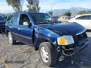 2007 GMC Envoy SLE with VIN 1GKDS13S072127977, listed as a IAAI auction lot 41119560 with 136,291 mi miles. Bid and sale history available at carsss.com. Image 1.