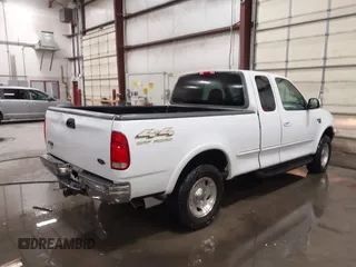 1998 Ford F-150 с VIN 1FTRX18L1WKB99239, выставлен на аукционе IAAI как лот 41987823 с пробегом 217 930 миль миль и . История ставок и продаж доступна на DreamBid. Изображение 4.