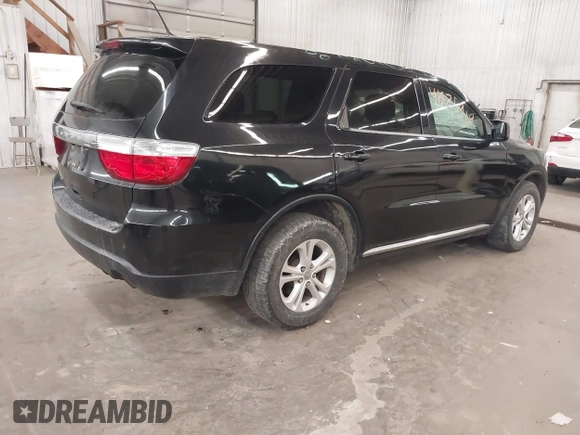 2013 Dodge Durango SXT with VIN 1C4RDJAG0DC512293, listed as a IAAI auction lot 41875919 with 191,128 mi miles and . Bid and sale history available at DreamBid. Image 4.
