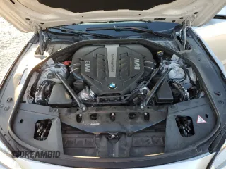 2015 BMW 7 Series 750i with VIN WBAYA8C53FGK19778, listed as a Copart auction lot 77258684 with 34,535 mi miles and Salvage title. Bid and sale history available at DreamBid. Image 11.