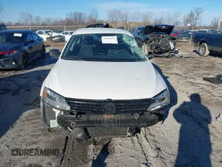2013 Volkswagen Jetta Sedan S with VIN 3VW2K7AJ6DM310317, listed as a IAAI auction lot 41682913 with 124,775 mi miles. Bid and sale history available at carsss.com. Image 12.