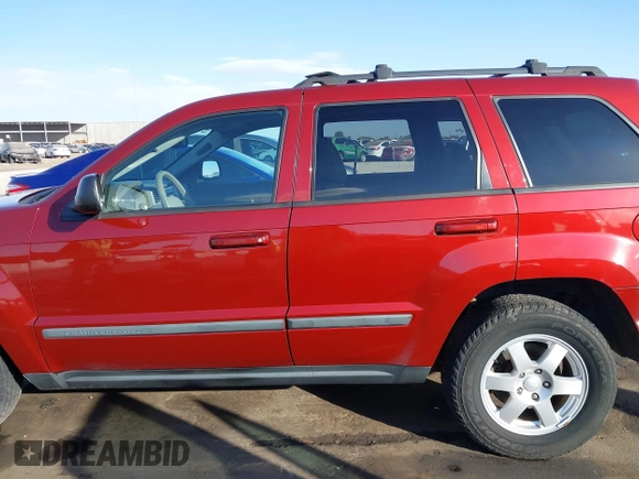 2008 Jeep Grand Cherokee Laredo with VIN 1J8GR48K08C233266, listed as a IAAI auction lot 41291164 with 159,208 mi miles. Bid and sale history available at carsss.com. Image 14.