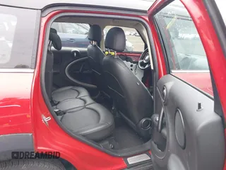 2013 MINI Cooper Countryman with VIN WMWZB3C57DWM07565, listed as a IAAI auction lot 41655938 with 62,694 mi miles. Bid and sale history available at carsss.com. Image 8.