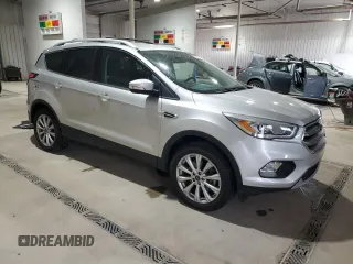 2017 Ford Escape Titanium with VIN 1FMCU9JD9HUC58945, listed as a Copart auction lot 52341485 with 31,074 mi miles and Salvage Title. Bid and sale history available at carsss.com. Image 4.
