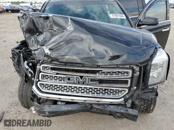 2019 GMC Yukon XL SLT with VIN 1GKS1GKC5KR327079, listed as a Copart auction lot 66189284 with 115,038 mi miles and Salvage Title. Bid and sale history available at carsss.com. Image 13.