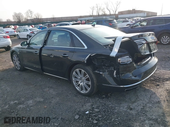 2015 Audi A8 3.0T with VIN WAU3GAFDXFN028244, listed as a IAAI auction lot 41791578 with 149,770 mi miles and . Bid and sale history available at DreamBid. Image 3.