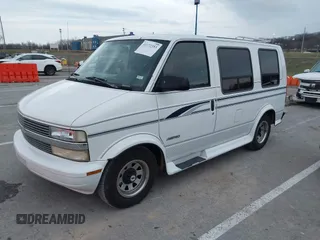 1995 Chevrolet Astro Cargo Van with VIN 1GBDM19W5SB172412, listed as a IAAI auction lot 41172353 with 119,531 mi miles. Bid and sale history available at carsss.com. Image 2.