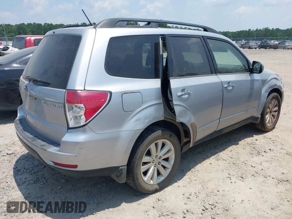 2012 Subaru Forester X Premium with VIN JF2SHBDC0CH409737, listed as a IAAI auction lot 42564484 with 226,983 mi miles and . Bid and sale history available at DreamBid. Image 4.