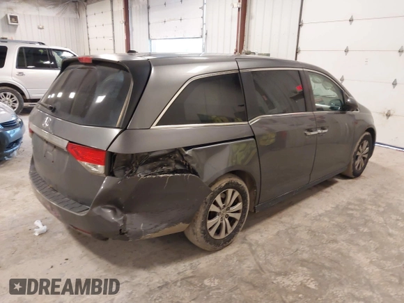 2014 Honda Odyssey EX-L with VIN 5FNRL5H67EB056983, listed as a IAAI auction lot 42318699 with 256,267 mi miles and . Bid and sale history available at DreamBid. Image 4.