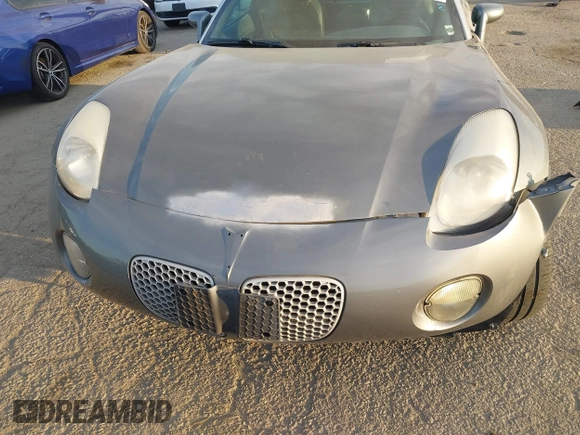 2006 Pontiac Solstice z VIN 1G2MB35B36Y119456, wystawiony jako IAAI lot #41850695 z przebiegiem 135 911 mil mil oraz . Historia ofert i sprzedaży dostępna na DreamBid. Obrazek 6.