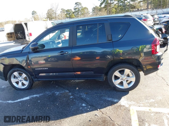 2015 Jeep Compass High Altitude Edition with VIN 1C4NJCEA0FD210511, listed as a IAAI auction lot 41209237 with 79,721 mi miles. Bid and sale history available at carsss.com. Image 14.