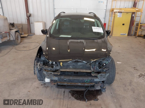 2014 Ford Escape SE with VIN 1FMCU9G95EUA16328, listed as a IAAI auction lot 42464235 with 108,570 mi miles and . Bid and sale history available at DreamBid. Image 6.