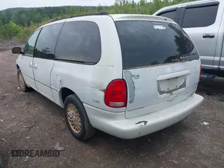 1998 Chrysler Town & Country LXi with VIN 1C4GP64L9WB664179, listed as a IAAI auction lot 42041600 with 1 mi miles. Bid and sale history available at carsss.com. Image 3.