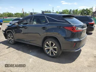 2019 Lexus RX 450h with VIN 2T2BGMCA3KC037404, listed as a Copart auction lot 61683875 with 76,316 mi miles and Salvage title. Bid and sale history available at DreamBid. Image 2.