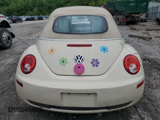 2009 Volkswagen Beetle S with VIN 3VWRF31Y99M409195, listed as a Copart auction lot 55010054 with 99,635 mi miles and Salvage title. Bid and sale history available at DreamBid. Image 6.