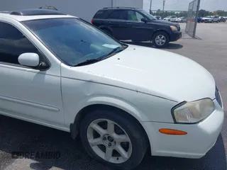 2000 Nissan Maxima GXE z VIN JN1CA31D6YT542083, wystawiony jako IAAI lot #42306685 z przebiegiem 296 613 mil mil oraz . Historia ofert i sprzedaży dostępna na DreamBid. Obrazek 12.