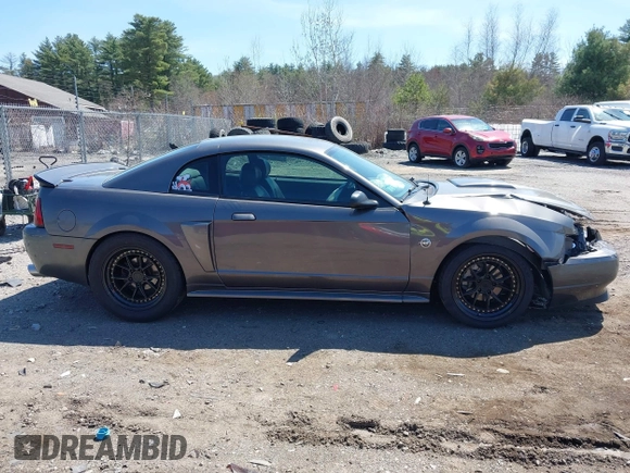 2004 Ford Mustang GT Deluxe with VIN 1FAFP42X44F142786, listed as a IAAI auction lot 42095619 with 100,020 mi miles and . Bid and sale history available at DreamBid. Image 13.