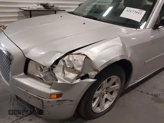 2006 Chrysler 300 Touring with VIN 2C3KA53G36H506880, listed as a IAAI auction lot 42177012 with 135,992 mi miles. Bid and sale history available at carsss.com. Image 6.