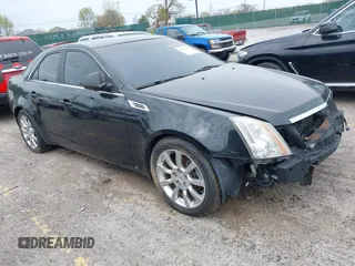 2009 Cadillac CTS AWD w/1SA with VIN 1G6DG577890126877, listed as a IAAI auction lot 42063927 with 117,444 mi miles. Bid and sale history available at carsss.com. Image 1.