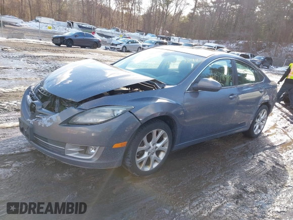 2009 Mazda 6 S Grand Touring with VIN 1YVHP82B995M06204, listed as a IAAI auction lot 41578992 with 140,255 mi miles and . Bid and sale history available at DreamBid. Image 2.