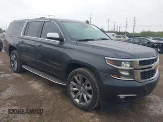2020 Chevrolet Suburban Premier z VIN 1GNSCJKC8LR290783, wystawiony jako IAAI lot #42636126 z przebiegiem 59 371 mil mil oraz . Historia ofert i sprzedaży dostępna na DreamBid. Obrazek 1.