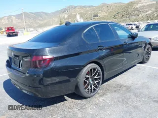 2013 BMW 5 Series 528i with VIN WBAXG5C50DDY35638, listed as a IAAI auction lot 39657715 with 139,765 mi miles and . Bid and sale history available at carsss.com. Image 4.