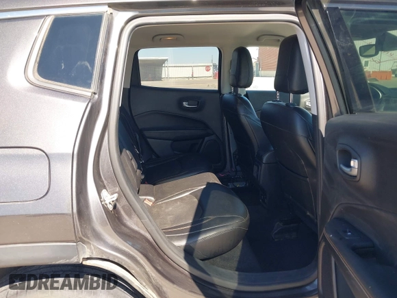 2018 Jeep Compass Altitude with VIN 3C4NJDBBXJT185252, listed as a IAAI auction lot 41847785 with 126,915 mi miles and . Bid and sale history available at carsss.com. Image 8.