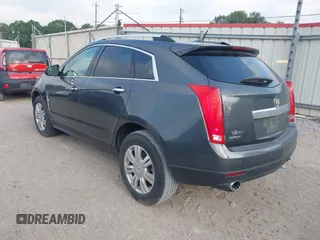 2012 Cadillac SRX Luxury Collection with VIN 3GYFNAE3XCS570616, listed as a IAAI auction lot 42030406 with 125,718 mi miles. Bid and sale history available at carsss.com. Image 3.
