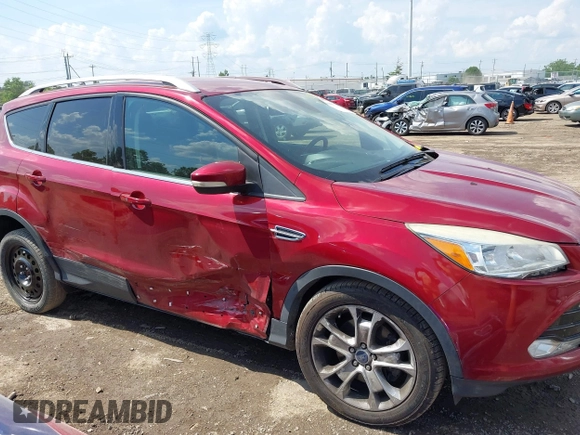2015 Ford Escape Titanium z VIN 1FMCU9J91FUC58933, wystawiony jako IAAI lot #42583736 z przebiegiem 147 359 mil mil oraz . Historia ofert i sprzedaży dostępna na DreamBid. Obrazek 13.