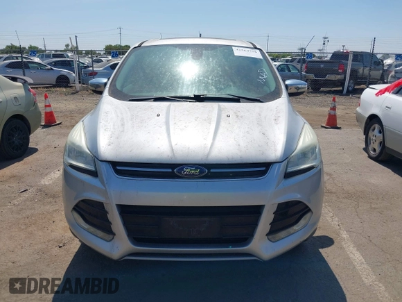 2013 Ford Escape SEL z VIN 1FMCU9H95DUC87631, wystawiony jako IAAI lot #42564756 z przebiegiem 144 467 mil mil oraz . Historia ofert i sprzedaży dostępna na DreamBid. Obrazek 6.