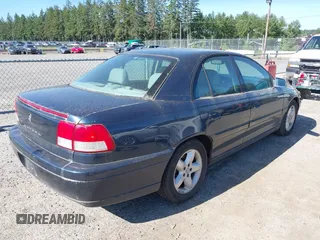 2000 Cadillac Catera z VIN W06VR54R3YR029454, wystawiony jako IAAI lot #42371242 z przebiegiem 166 182 mil mil oraz . Historia ofert i sprzedaży dostępna na DreamBid. Obrazek 4.