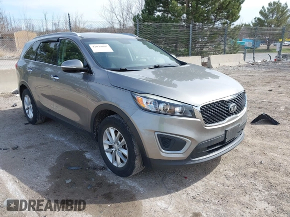 2017 Kia Sorento LX with VIN 5XYPG4A3XHG297598, listed as a IAAI auction lot 42029607 with 104,157 mi miles. Bid and sale history available at carsss.com. Image 1.