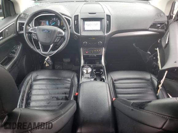 2019 Ford Edge SEL with VIN 2FMPK4J92KBB34891, listed as a Copart auction lot 60050945 with 104,942 mi miles and Salvage title. Bid and sale history available at DreamBid. Image 8.