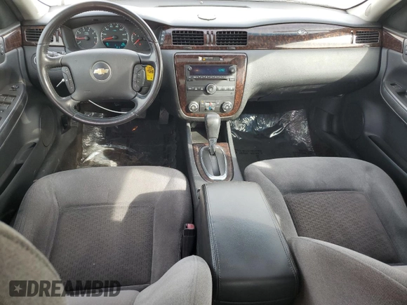 2014 Chevrolet Impala LT z VIN 2G1WB5E34E1133059, wystawiony jako Copart lot #47658895 z przebiegiem 57 557 mil mil oraz Szkoda całkowita • Salvage title. Historia ofert i sprzedaży dostępna na DreamBid. Obrazek 8.