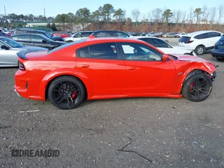 2022 Dodge Charger Scat Pack Widebody with VIN 2C3CDXGJ3NH101081, listed as a IAAI auction lot 41351466 with 9,575 mi miles and . Bid and sale history available at DreamBid. Image 5.