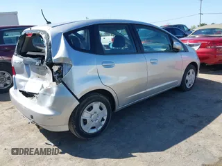 2013 Honda Fit with VIN JHMGE8H31DC042192, listed as a IAAI auction lot 42036582 with 63,223 mi miles. Bid and sale history available at carsss.com. Image 4.