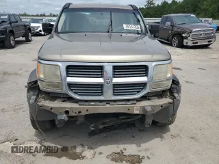 2007 Dodge Nitro SXT z VIN 1D8GT28KX7W596489, wystawiony jako Copart lot #56151355 z przebiegiem 295 949 mil mil oraz Szkoda całkowita • Salvage title. Historia ofert i sprzedaży dostępna na DreamBid. Obrazek 5.