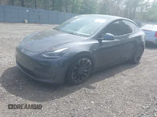 2022 Tesla Model Y Performance with VIN 7SAYGDEF3NF324705, listed as a IAAI auction lot 42076565 with 66,573 mi miles and . Bid and sale history available at carsss.com. Image 2.
