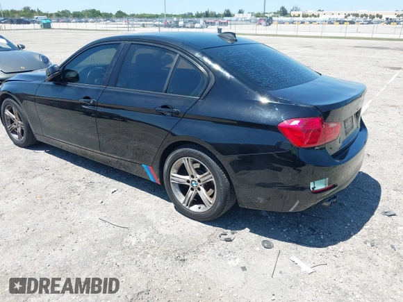 2015 BMW 3 Series 328i with VIN WBA3C1C58FK123489, listed as a IAAI auction lot 42026400 with 127,880 mi miles and . Bid and sale history available at carsss.com. Image 3.