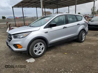 2018 Ford Escape S with VIN 1FMCU0F77JUC39556, listed as a Copart auction lot 46264845 with 50,932 mi miles and Salvage title. Bid and sale history available at DreamBid. Image 1.