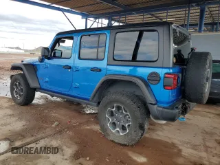 2023 Jeep Wrangler Rubicon with VIN 1C4JJXR69PW581362, listed as a Copart auction lot 58557795 with 34,357 mi miles and Salvage title. Bid and sale history available at DreamBid. Image 2.
