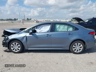 2023 Toyota Corolla Hybrid LE with VIN JTDBCMFE8PJ010693, listed as a IAAI auction lot 41736641 with 10,751 mi miles. Bid and sale history available at carsss.com. Image 15.