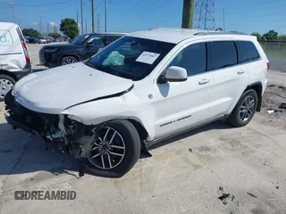 2020 Jeep Grand Cherokee Laredo with VIN 1C4RJFAG5LC258309, listed as a IAAI auction lot 42573007 with 68,980 mi miles and . Bid and sale history available at DreamBid. Image 2.