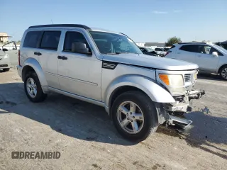 2011 Dodge Nitro SXT z VIN 1D4PT5GK5BW541154, wystawiony jako Copart lot #72741154 z przebiegiem 154 746 mil mil oraz Szkoda całkowita • Salvage title. Historia ofert i sprzedaży dostępna na DreamBid. Obrazek 4.