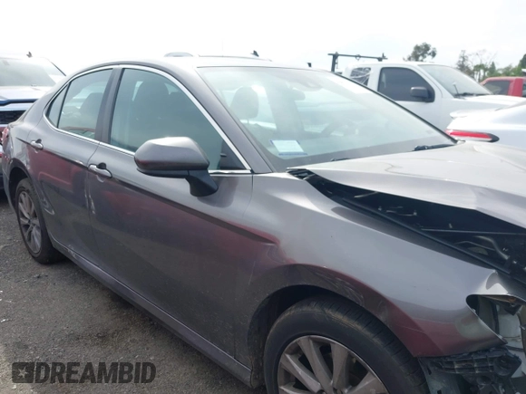 2019 Toyota Camry LE with VIN 4T1B11HK4KU254853, listed as a IAAI auction lot 42013255 with 153,664 mi miles and . Bid and sale history available at DreamBid. Image 13.