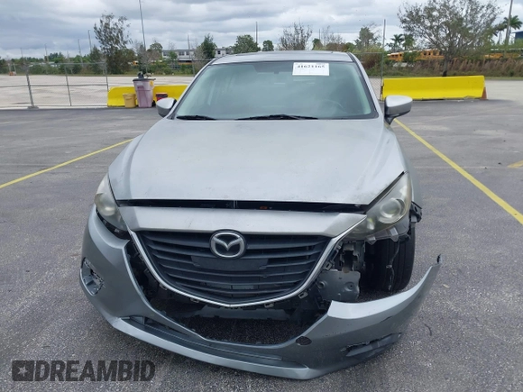 2014 Mazda 3 i Grand Touring with VIN JM1BM1M73E1216596, listed as a IAAI auction lot 41621165 with 127,235 mi miles and . Bid and sale history available at DreamBid. Image 12.