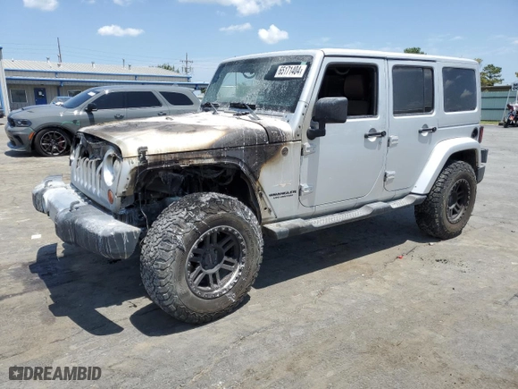 2011 Jeep Wrangler Unlimited Sahara with VIN 1J4BA5H14BL613895, listed as a Copart auction lot 65171404 with 0 mi miles and Non Repairable. Bid and sale history available at carsss.com. Image 1.