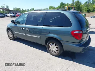 2007 Chrysler Town & Country LWB Touring with VIN 2A4GP54L47R167189, listed as a IAAI auction lot 42143590 with 165,547 mi miles. Bid and sale history available at carsss.com. Image 3.