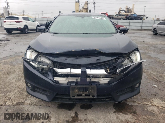 2018 Honda Civic EX-T z VIN JHMFC1F32JX006088, wystawiony jako Copart lot #50563105 z przebiegiem 117 744 mil mil oraz Szkoda całkowita • Salvage title. Historia ofert i sprzedaży dostępna na DreamBid. Obrazek 5.